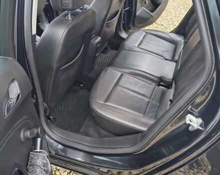 Черный Опель Астра, объемом двигателя 2 л и пробегом 175 тыс. км за 8300 $, фото 16 на Automoto.ua