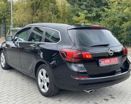 Черный Опель Астра, объемом двигателя 1.6 л и пробегом 125 тыс. км за 7450 $, фото 6 на Automoto.ua