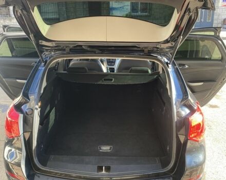 Черный Опель Астра, объемом двигателя 1.7 л и пробегом 260 тыс. км за 7500 $, фото 16 на Automoto.ua