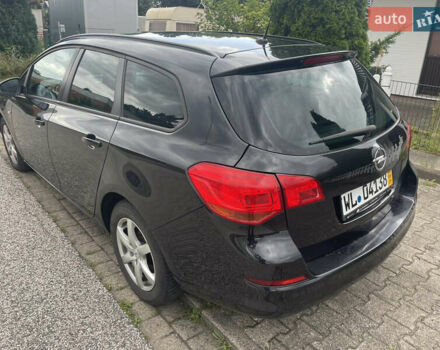 Черный Опель Астра, объемом двигателя 1.7 л и пробегом 230 тыс. км за 5950 $, фото 16 на Automoto.ua