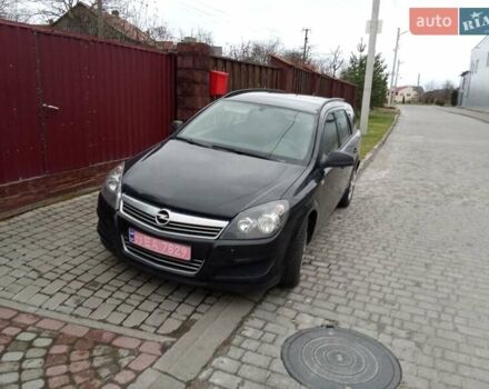 Черный Опель Астра, объемом двигателя 1.69 л и пробегом 260 тыс. км за 5600 $, фото 2 на Automoto.ua