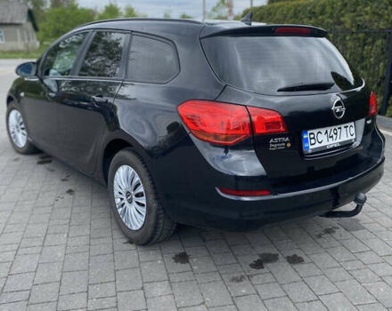 Черный Опель Астра, объемом двигателя 1.7 л и пробегом 265 тыс. км за 6300 $, фото 12 на Automoto.ua