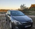 Черный Опель Астра, объемом двигателя 1.2 л и пробегом 261 тыс. км за 6500 $, фото 1 на Automoto.ua