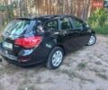 Черный Опель Астра, объемом двигателя 1.25 л и пробегом 232 тыс. км за 7200 $, фото 5 на Automoto.ua