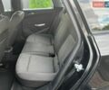 Черный Опель Астра, объемом двигателя 1.3 л и пробегом 269 тыс. км за 5999 $, фото 6 на Automoto.ua