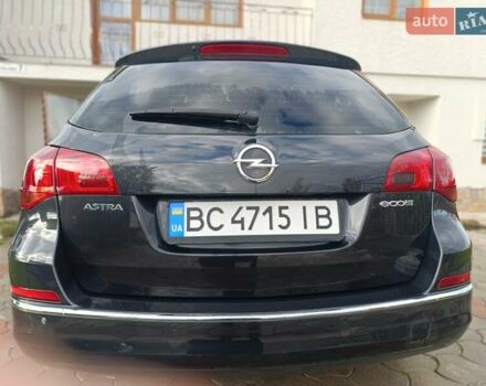 Черный Опель Астра, объемом двигателя 1.69 л и пробегом 230 тыс. км за 8000 $, фото 13 на Automoto.ua