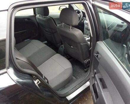 Черный Опель Астра, объемом двигателя 1.69 л и пробегом 260 тыс. км за 5600 $, фото 7 на Automoto.ua