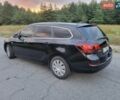 Черный Опель Астра, объемом двигателя 1.3 л и пробегом 184 тыс. км за 7000 $, фото 4 на Automoto.ua