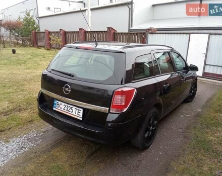 Черный Опель Астра, объемом двигателя 1.69 л и пробегом 260 тыс. км за 5600 $, фото 4 на Automoto.ua