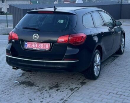 Черный Опель Астра, объемом двигателя 1.4 л и пробегом 275 тыс. км за 7500 $, фото 1 на Automoto.ua