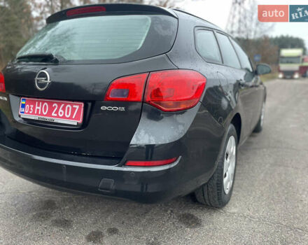 Черный Опель Астра, объемом двигателя 1.4 л и пробегом 210 тыс. км за 5900 $, фото 10 на Automoto.ua
