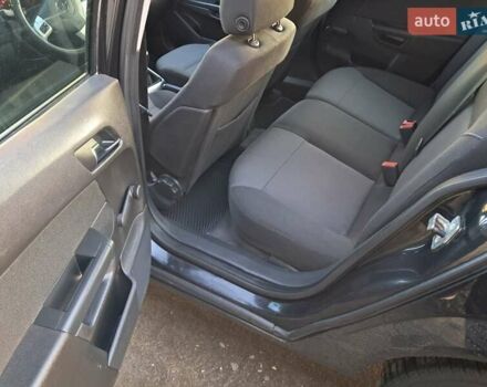Черный Опель Астра, объемом двигателя 1.6 л и пробегом 318 тыс. км за 5400 $, фото 4 на Automoto.ua