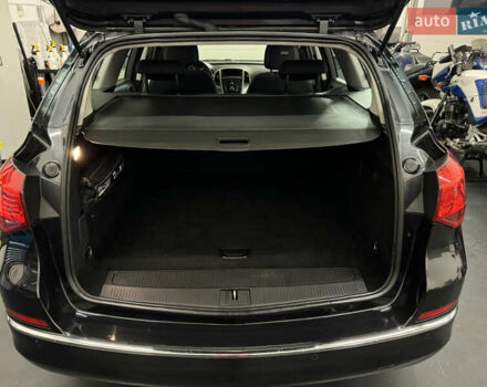 Черный Опель Астра, объемом двигателя 1.4 л и пробегом 203 тыс. км за 7250 $, фото 9 на Automoto.ua