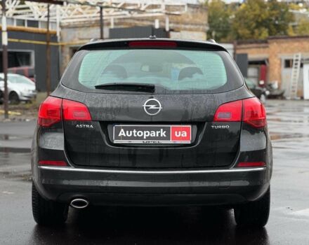 Черный Опель Астра, объемом двигателя 1.4 л и пробегом 211 тыс. км за 6940 $, фото 4 на Automoto.ua