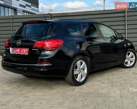 Черный Опель Астра, объемом двигателя 1.7 л и пробегом 218 тыс. км за 8500 $, фото 15 на Automoto.ua