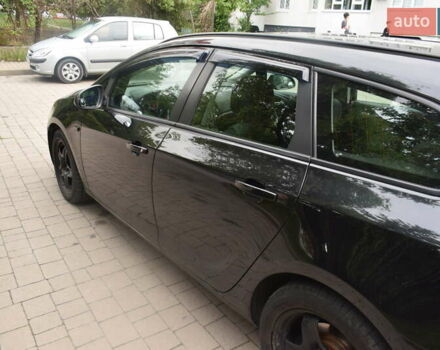 Черный Опель Астра, объемом двигателя 1.69 л и пробегом 222 тыс. км за 7500 $, фото 1 на Automoto.ua