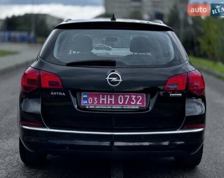 Черный Опель Астра, объемом двигателя 1.4 л и пробегом 158 тыс. км за 7400 $, фото 11 на Automoto.ua