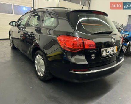 Черный Опель Астра, объемом двигателя 1.4 л и пробегом 203 тыс. км за 7250 $, фото 20 на Automoto.ua