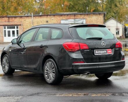 Черный Опель Астра, объемом двигателя 1.4 л и пробегом 211 тыс. км за 6940 $, фото 3 на Automoto.ua