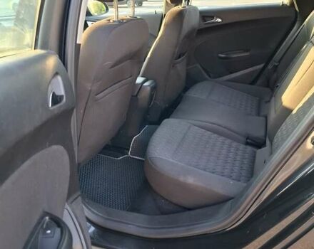 Черный Опель Астра, объемом двигателя 1.4 л и пробегом 236 тыс. км за 8200 $, фото 2 на Automoto.ua