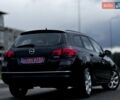 Черный Опель Астра, объемом двигателя 1.4 л и пробегом 158 тыс. км за 7400 $, фото 4 на Automoto.ua