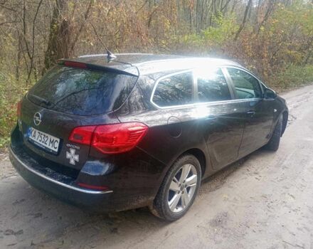 Черный Опель Астра, объемом двигателя 1.7 л и пробегом 228 тыс. км за 7300 $, фото 3 на Automoto.ua
