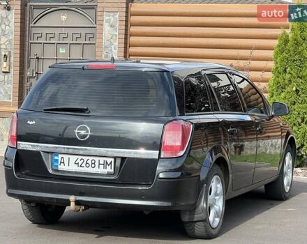 Черный Опель Астра, объемом двигателя 1.6 л и пробегом 145 тыс. км за 6400 $, фото 17 на Automoto.ua