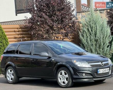 Черный Опель Астра, объемом двигателя 1.6 л и пробегом 145 тыс. км за 6400 $, фото 11 на Automoto.ua