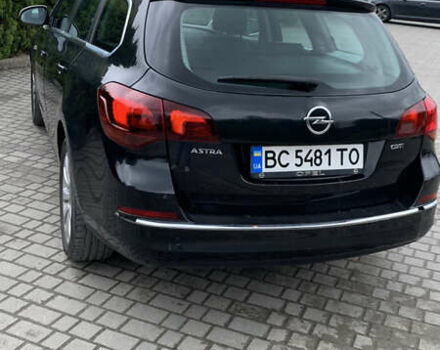 Черный Опель Астра, объемом двигателя 1.7 л и пробегом 234 тыс. км за 8700 $, фото 3 на Automoto.ua