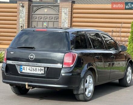 Черный Опель Астра, объемом двигателя 1.6 л и пробегом 145 тыс. км за 6400 $, фото 18 на Automoto.ua