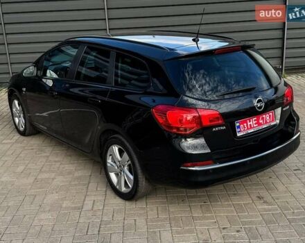 Черный Опель Астра, объемом двигателя 1.7 л и пробегом 218 тыс. км за 8500 $, фото 14 на Automoto.ua
