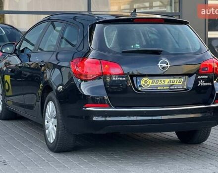 Опель Астра 2013 в Ивано-Франковске на Automoto.ua Черный Опель Астра, объемом двигателя 1.69 л и пробегом 216 тыс. км за 7800 $, фото 4 на Automoto.ua