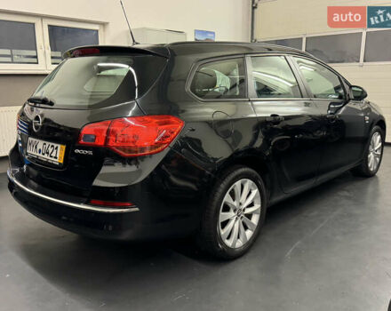 Черный Опель Астра, объемом двигателя 1.4 л и пробегом 203 тыс. км за 7250 $, фото 2 на Automoto.ua