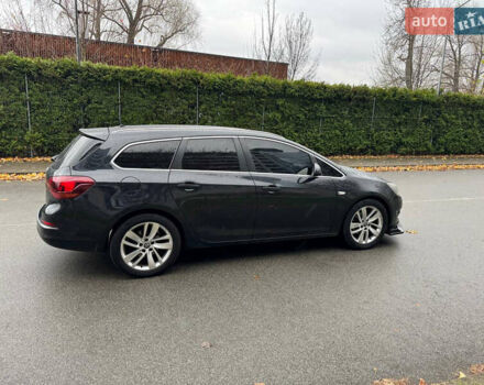 Черный Опель Астра, объемом двигателя 1.7 л и пробегом 245 тыс. км за 7000 $, фото 12 на Automoto.ua