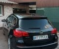 Черный Опель Астра, объемом двигателя 1.7 л и пробегом 254 тыс. км за 8300 $, фото 11 на Automoto.ua