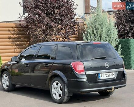 Черный Опель Астра, объемом двигателя 1.6 л и пробегом 145 тыс. км за 6400 $, фото 12 на Automoto.ua