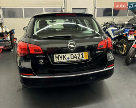 Черный Опель Астра, объемом двигателя 1.4 л и пробегом 203 тыс. км за 7250 $, фото 3 на Automoto.ua