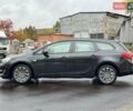Черный Опель Астра, объемом двигателя 1.4 л и пробегом 211 тыс. км за 7790 $, фото 4 на Automoto.ua