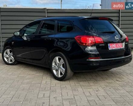 Черный Опель Астра, объемом двигателя 1.7 л и пробегом 218 тыс. км за 8500 $, фото 16 на Automoto.ua