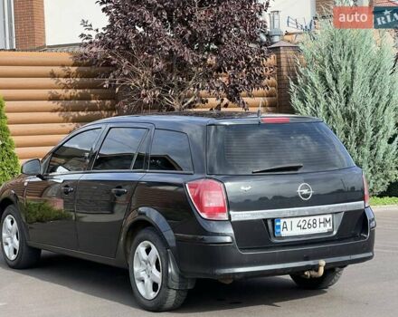 Черный Опель Астра, объемом двигателя 1.6 л и пробегом 145 тыс. км за 6400 $, фото 13 на Automoto.ua