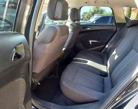 Черный Опель Астра, объемом двигателя 2 л и пробегом 287 тыс. км за 8200 $, фото 9 на Automoto.ua