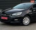 Черный Опель Астра, объемом двигателя 1.4 л и пробегом 180 тыс. км за 7500 $, фото 1 на Automoto.ua