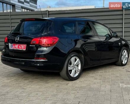 Черный Опель Астра, объемом двигателя 1.7 л и пробегом 218 тыс. км за 8500 $, фото 12 на Automoto.ua