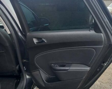 Черный Опель Астра, объемом двигателя 1.4 л и пробегом 171 тыс. км за 7547 $, фото 2 на Automoto.ua