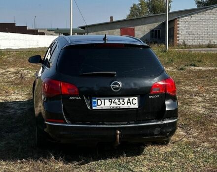 Черный Опель Астра, объемом двигателя 1.7 л и пробегом 309 тыс. км за 5600 $, фото 8 на Automoto.ua