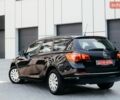 Черный Опель Астра, объемом двигателя 1.7 л и пробегом 235 тыс. км за 7150 $, фото 16 на Automoto.ua