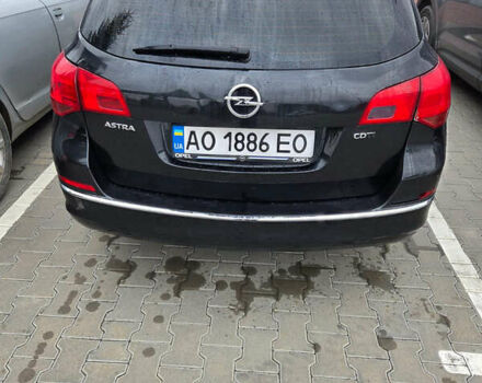 Черный Опель Астра, объемом двигателя 1.69 л и пробегом 281 тыс. км за 7000 $, фото 4 на Automoto.ua