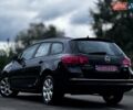 Черный Опель Астра, объемом двигателя 1.4 л и пробегом 158 тыс. км за 7400 $, фото 3 на Automoto.ua