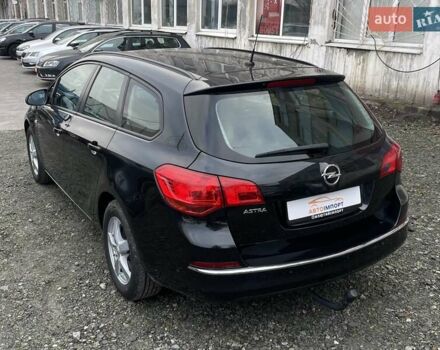 Черный Опель Астра, объемом двигателя 1.5 л и пробегом 197 тыс. км за 9400 $, фото 7 на Automoto.ua