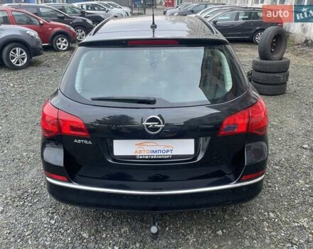 Черный Опель Астра, объемом двигателя 1.5 л и пробегом 197 тыс. км за 9400 $, фото 8 на Automoto.ua